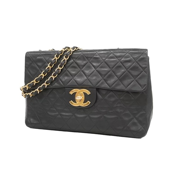 CHANEL Handbags - Authentic CHANEL JUMBO black lambskin quilted bag